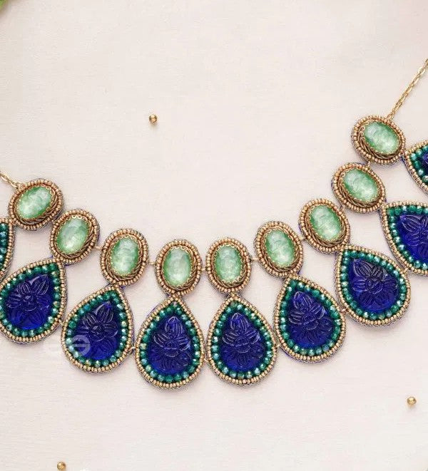 Golden Necklace Embedded with Blue Gemstones