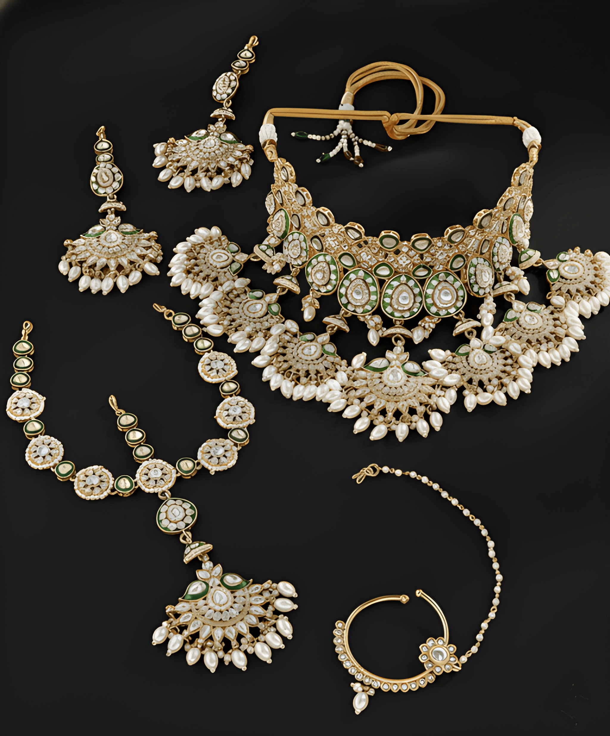 Comprehensive bridal jewelry set: necklace, earrings with chains, head jewelry and a nose ring